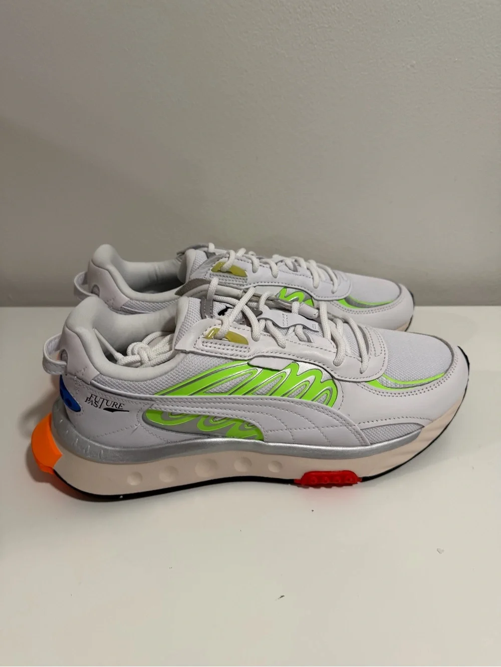 Puma White Sneakers with Neon Green and Orange Accents